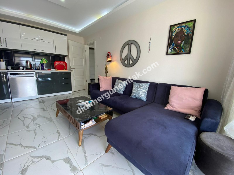 AKBÜK’TE HAVUZLU SİTE İÇERİSİNDE DENİZ MANZARALI 2+1 FIRSAT DAİRE!