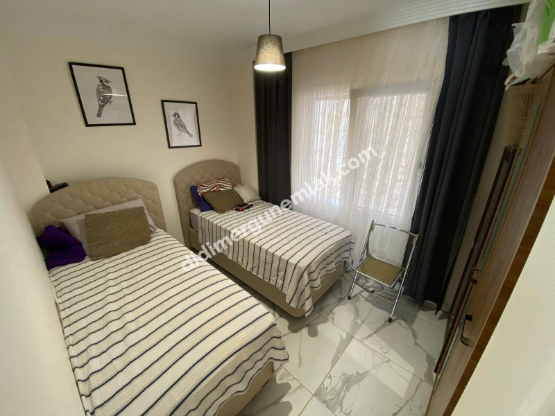 AKBÜK’TE HAVUZLU SİTE İÇERİSİNDE DENİZ MANZARALI 2+1 FIRSAT DAİRE!