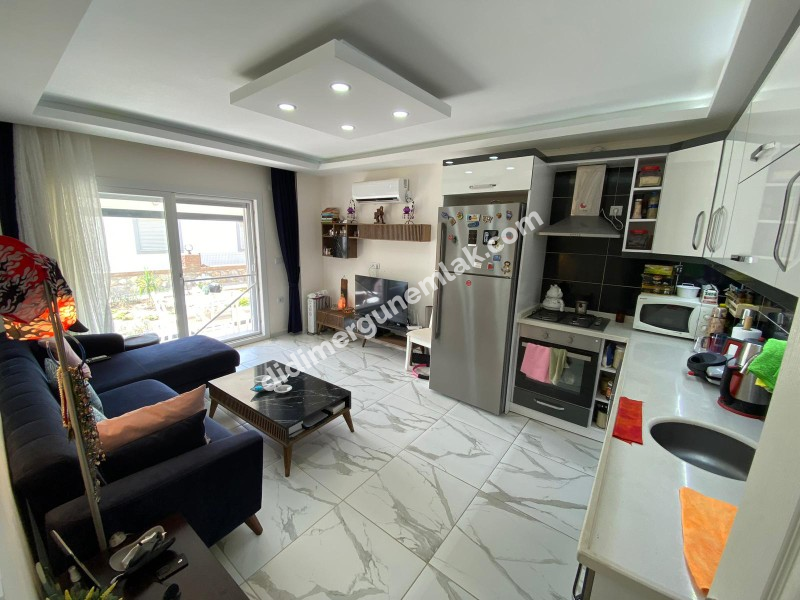 AKBÜK’TE HAVUZLU SİTE İÇERİSİNDE DENİZ MANZARALI 2+1 FIRSAT DAİRE!