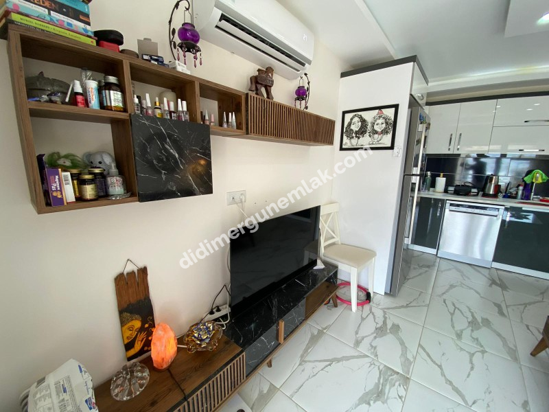 AKBÜK’TE HAVUZLU SİTE İÇERİSİNDE DENİZ MANZARALI 2+1 FIRSAT DAİRE!