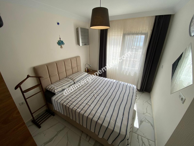 AKBÜK’TE HAVUZLU SİTE İÇERİSİNDE DENİZ MANZARALI 2+1 FIRSAT DAİRE!
