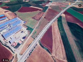DijitalEmlak’tan Karacabey Bandırma yolunda Satılık 15.700 m2 Yatırımlık Arazi.
