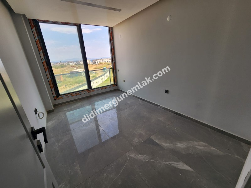 ALTINKUM MAHALLESİ’NDE DENİZ MANZARALI SIFIR 2+1 LÜKS DAİRE