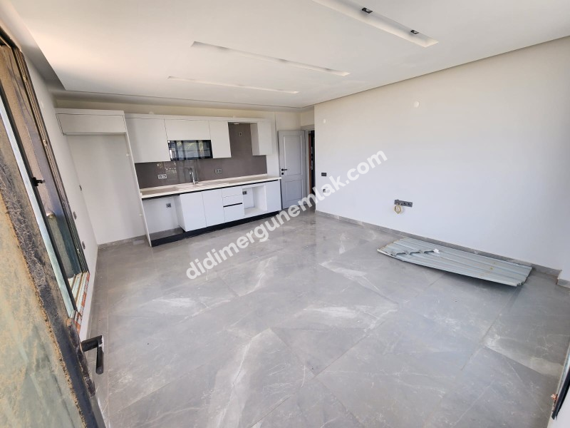 ALTINKUM MAHALLESİ’NDE DENİZ MANZARALI SIFIR 2+1 LÜKS DAİRE