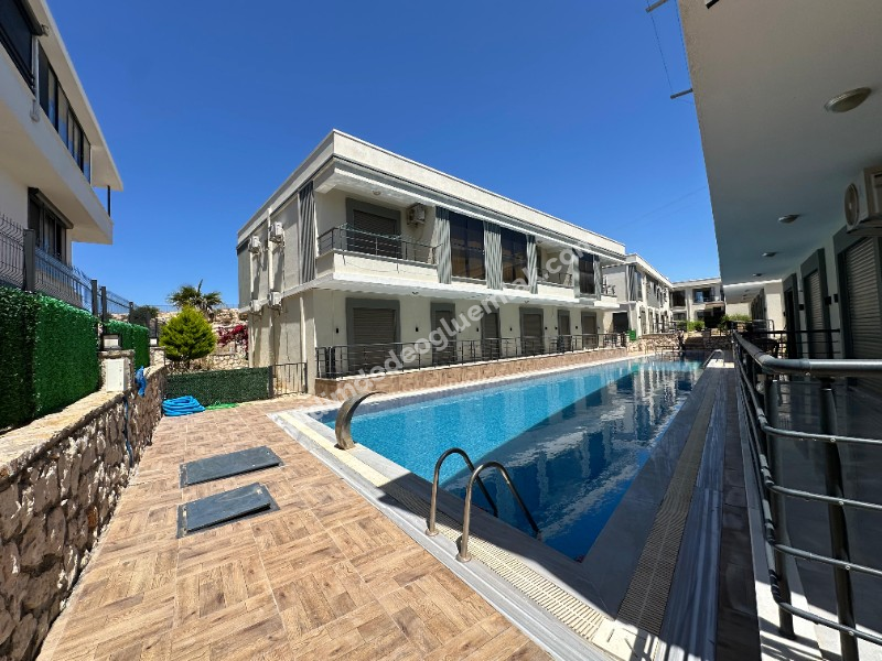 DİDİMDE DENİZE 600 MT. HAVUZLU SİTEDE UYGUN FİYATLI VİLLA