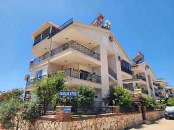  ALTINKUM MAHALLESİ'NDE HAVUZLU SİTE İÇERİSİNDE | EŞYALI | KALORİFERLİ | PANJURLU 1. KAT FIRSAT DAİRE! 