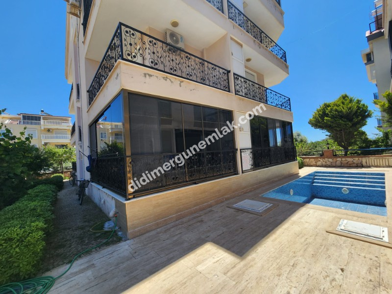  ALTINKUM MAHALLESİ'NDE HAVUZLU SİTE İÇERİSİNDE | EŞYALI | KALORİFERLİ | PANJURLU 1. KAT FIRSAT DAİRE! 