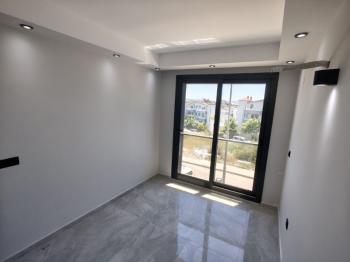 Didim Efeler Mahallesinde Satılık Sıfır 2+1 Asansörlü Kapalı Otoparklı Daire