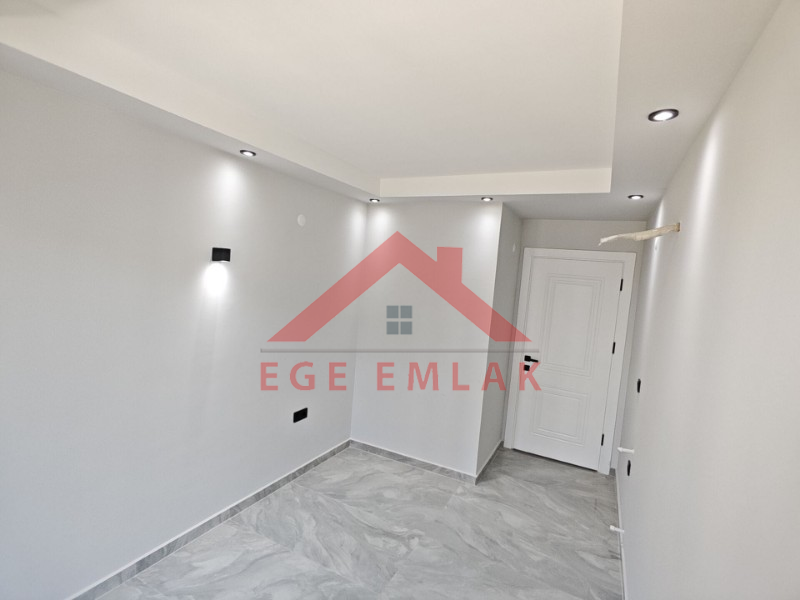 Didim Efeler Mahallesinde Satılık Sıfır 2+1 Asansörlü Kapalı Otoparklı Daire