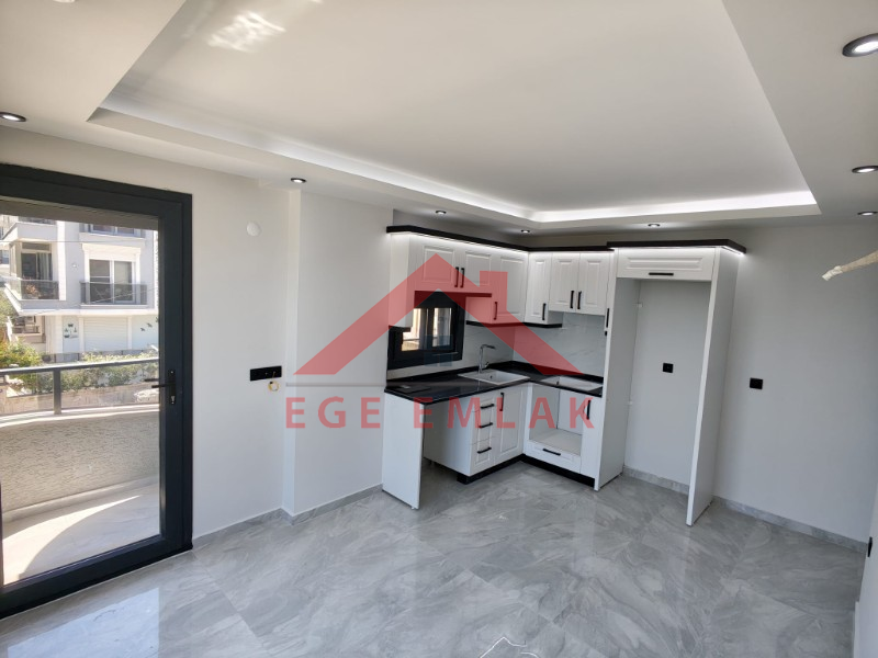 Didim Efeler Mahallesinde Satılık Sıfır 2+1 Asansörlü Kapalı Otoparklı Daire