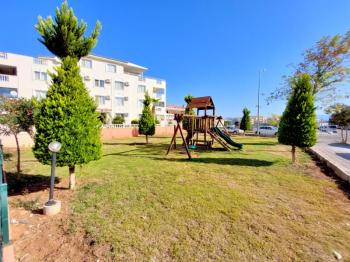 Didim Çamlık'ta Ünlü Royal Marina Complex İçinde Satılık Havuz Gören Eşyalı Giriş Kat Daire