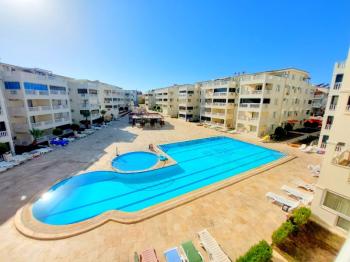 Didim Çamlık'ta Ünlü Royal Marina Complex İçinde Satılık Havuz Gören Eşyalı Giriş Kat Daire