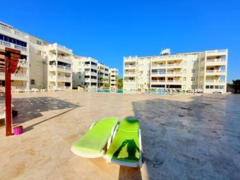 Didim Çamlık'ta Ünlü Royal Marina Complex İçinde Satılık Havuz Gören Eşyalı Giriş Kat Daire