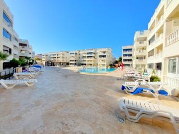 Didim Çamlık'ta Ünlü Royal Marina Complex İçinde Satılık Havuz Gören Eşyalı Giriş Kat Daire