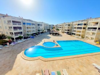 Didim Çamlık'ta Ünlü Royal Marina Complex İçinde Satılık Havuz Gören Eşyalı Giriş Kat Daire