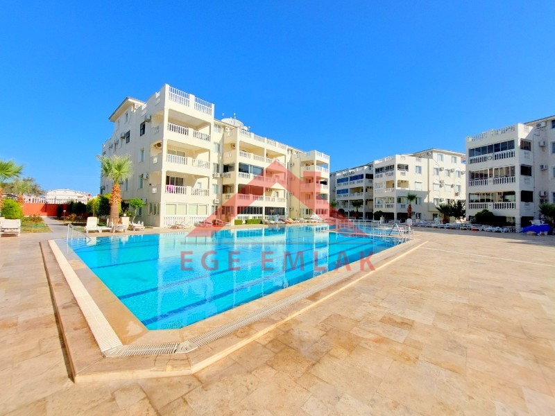 Didim Çamlık'ta Ünlü Royal Marina Complex İçinde Satılık Havuz Gören Eşyalı Giriş Kat Daire