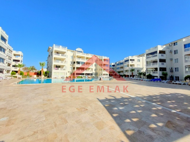 Didim Çamlık'ta Ünlü Royal Marina Complex İçinde Satılık Havuz Gören Eşyalı Giriş Kat Daire