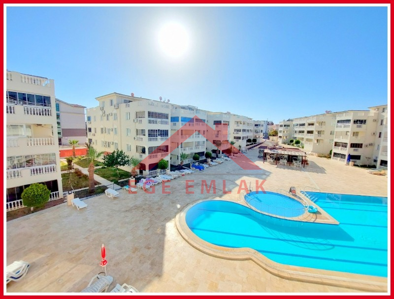 Didim Çamlık'ta Ünlü Royal Marina Complex İçinde Satılık Havuz Gören Eşyalı Giriş Kat Daire