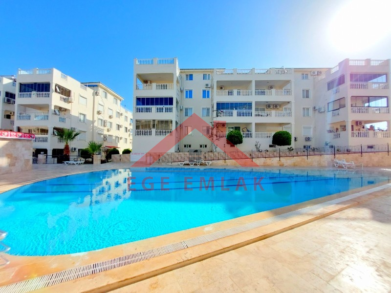 Didim Çamlık'ta Ünlü Royal Marina Complex İçinde Satılık Havuz Gören Eşyalı Giriş Kat Daire