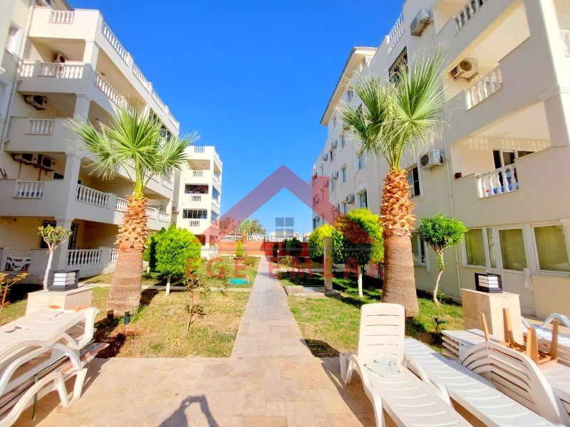 Didim Çamlık'ta Ünlü Royal Marina Complex İçinde Satılık Havuz Gören Eşyalı Giriş Kat Daire
