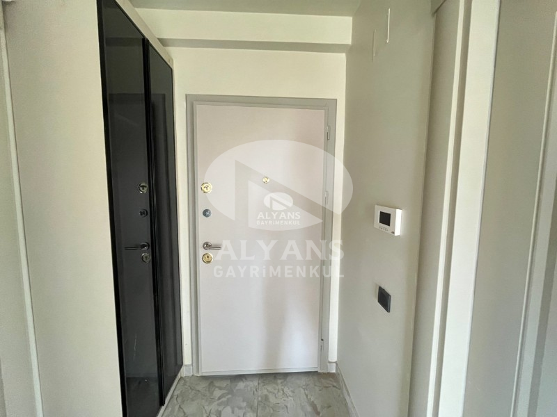 ALYANS'TAN 75.YIL'DA SİTE İÇİ GENİŞ OTURUMLU SIFIR 2+1