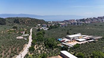 MUDANYA IŞIKLI YOLU'NDA 2.600M2 ARSASI, 440 M2 KAPALI ALANI OLAN KİRALIK DEPO