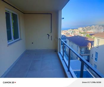 MUDANYA HALİTPAŞA 'da SATILIK 100 M2 AYRI MUTFAKLI DENİZ GÖRÜR SIFIR 2+1 DAİRE
