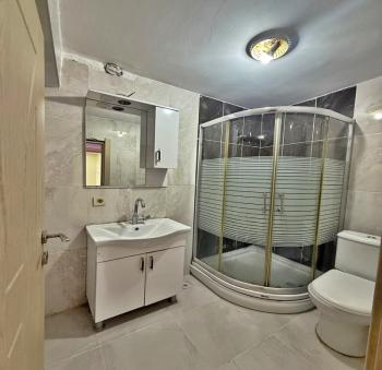 GENİŞ m2 MERKEZİ KONUM ŞIK TASARIM 2+1 BAHÇE KATI SATILIK DAİRE