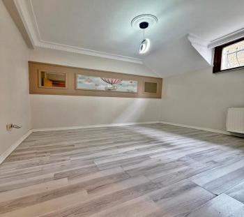GENİŞ m2 MERKEZİ KONUM ŞIK TASARIM 2+1 BAHÇE KATI SATILIK DAİRE