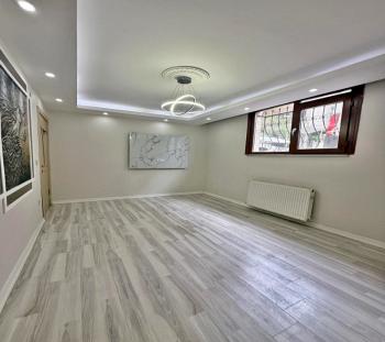 GENİŞ m2 MERKEZİ KONUM ŞIK TASARIM 2+1 BAHÇE KATI SATILIK DAİRE