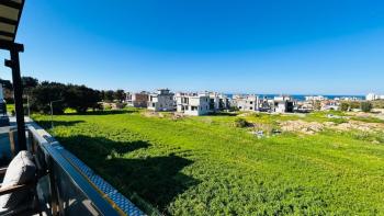 KARŞIYAKA'DA AKILLI EV SİSTEMLİ TRİPLEKS DAİRE | 150 m² TOPLAM ALAN | DENİZ & DAĞ MANZARASI | ORTAK HAVUZ