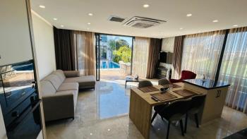 KARŞIYAKA'DA AKILLI EV SİSTEMLİ TRİPLEKS DAİRE | 150 m² TOPLAM ALAN | DENİZ & DAĞ MANZARASI | ORTAK HAVUZ