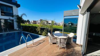 KARŞIYAKA'DA AKILLI EV SİSTEMLİ TRİPLEKS DAİRE | 150 m² TOPLAM ALAN | DENİZ & DAĞ MANZARASI | ORTAK HAVUZ