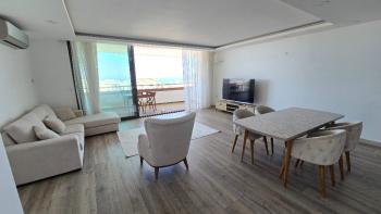 AKACAN ELEGANCE’TA | 7. KATTA | PANORAMİK DAĞ VE DENİZ MANZARALI | 45 m² DEV BALKONLU |  EŞYALI 3+1 KÖŞE DAİRE