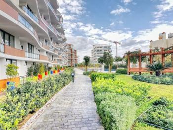 AKACAN ELEGANCE’TA | 7. KATTA | PANORAMİK DAĞ VE DENİZ MANZARALI | 45 m² DEV BALKONLU |  EŞYALI 3+1 KÖŞE DAİRE