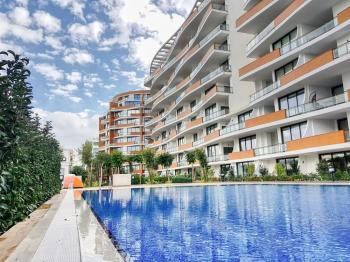 AKACAN ELEGANCE’TA | 7. KATTA | PANORAMİK DAĞ VE DENİZ MANZARALI | 45 m² DEV BALKONLU |  EŞYALI 3+1 KÖŞE DAİRE
