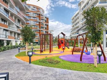 AKACAN ELEGANCE’TA | 7. KATTA | PANORAMİK DAĞ VE DENİZ MANZARALI | 45 m² DEV BALKONLU |  EŞYALI 3+1 KÖŞE DAİRE