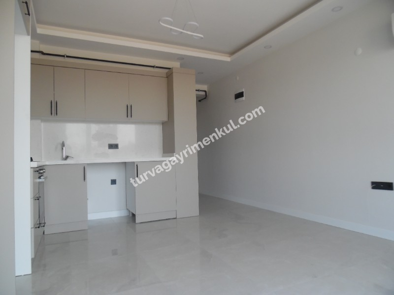 RESMİ KURUMLARA VE ÜNİVERSİTEYE YAKIN 1+1 AMERİKAN MUTFAKLI KİRALIK DAİRE 