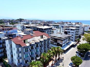 Didim Altınkum’da Denize Yakın Satılık 1+1 Daire | Triton Apartmanı - Bulvar Cepheli