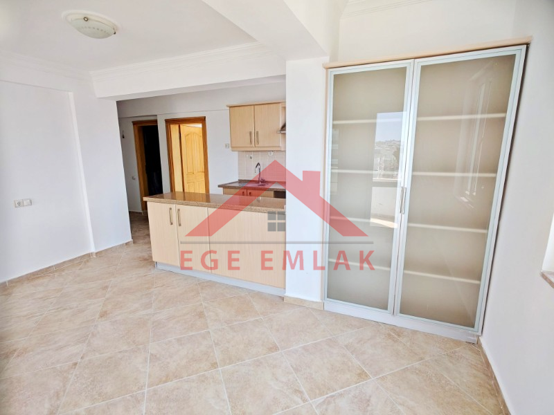 Didim Altınkum’da Denize Yakın Satılık 1+1 Daire | Triton Apartmanı - Bulvar Cepheli