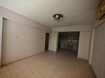 Didim Yeni Mahalle'de Merkezi Konumda Satılık 2+1 Ara Kat Daire