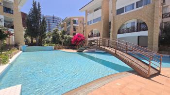 KKTC Girne Merkez'de Öğretmenevi Yakını Havuzlu Sitede Kiralık Full Eşyalı 1+1 Daire