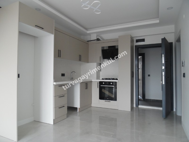 DEVLET HASTANESİ VE ADLİYE YAKININDA KİRALIK 1+1 DAİRE 