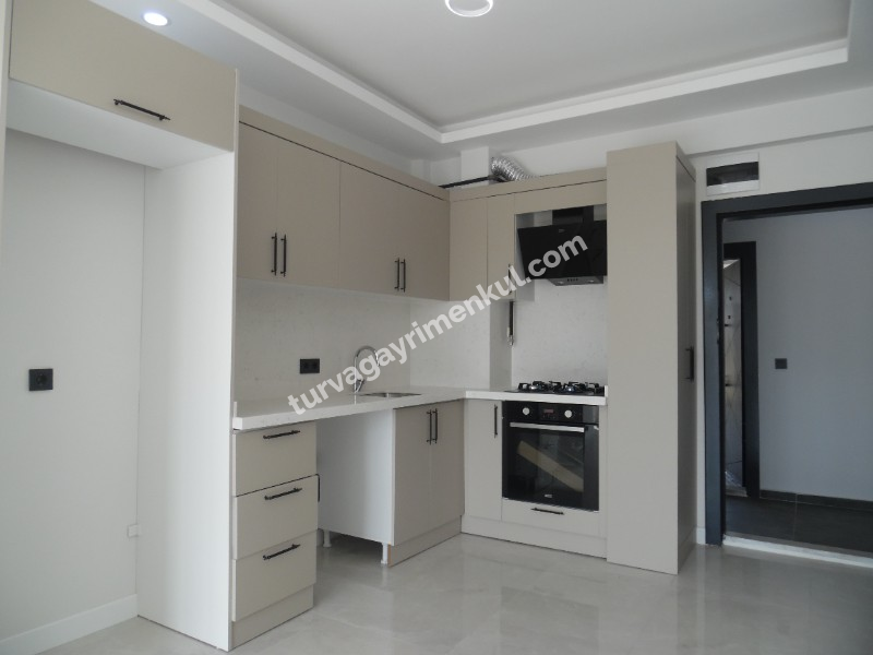 DEVLET HASTANESİ VE ADLİYE YAKININDA KİRALIK 1+1 DAİRE 