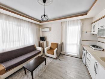 Didim Hisar Mahallesi’nde Eşyalı Satılık 1+1 Ara Kat Daire