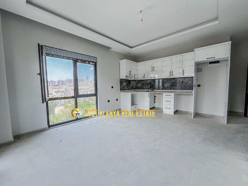 ALANYA ÇIPLAKLI MAHALLESİ'NDE SATILIK SIFIR GENİŞ 1+1 DAİRE