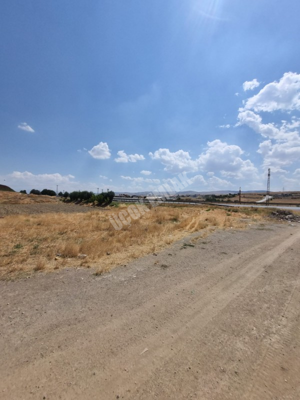 AFYON ÜÇOK EMLAKTAN SÜLÜMENLİ DE KONYA YOLU YAKINI SATILIK TİCARİ İMARLI ARSA