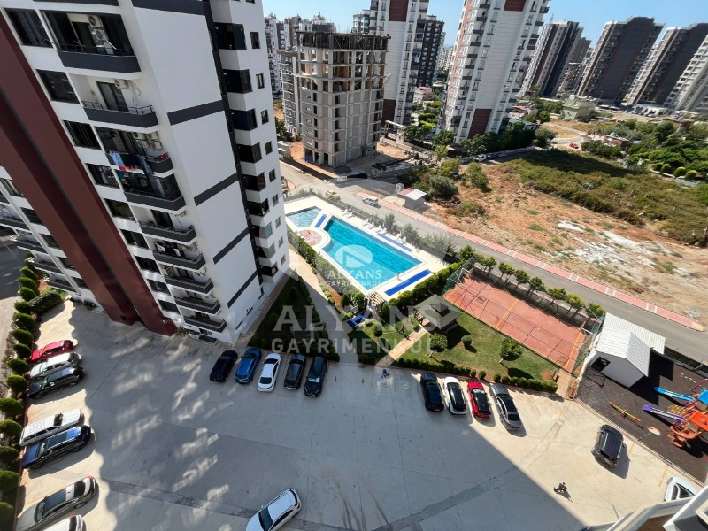 ALYANS'TAN LÜKS SİTE İÇERİSİNDE GENİŞ BALKONLU KİRALIK 2+1