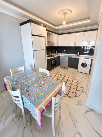 Didim Hisar Mahallesi Hünkar Rezidans’ta Havuzlu Eşyalı 2+1 Ara Kat Daire