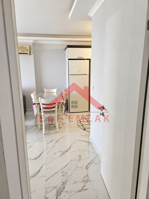 Didim Hisar Mahallesi Hünkar Rezidans’ta Havuzlu Eşyalı 2+1 Ara Kat Daire